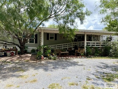 Welcome to this charming home sitting on just over 13 acres in