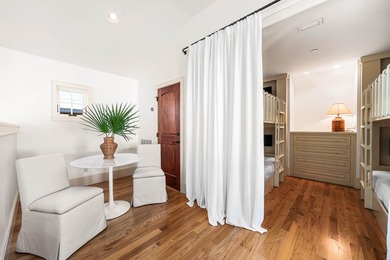 This timeless, Rosemary Beach home offers an inviting covered - photo 45
