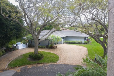 Lake Home For Sale in Tequesta, Florida