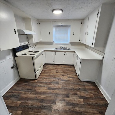 Three free standing efficiency apartments with kitchenettes - photo 2