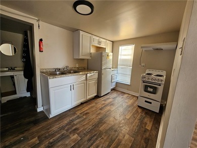 Three free standing efficiency apartments with kitchenettes - photo 7