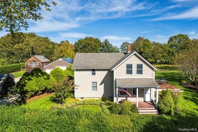Set on 1.16 acres of beautifully landscaped and private grounds - photo 1