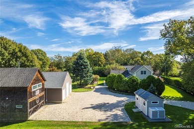 Set on 1.16 acres of beautifully landscaped and private grounds - photo 2