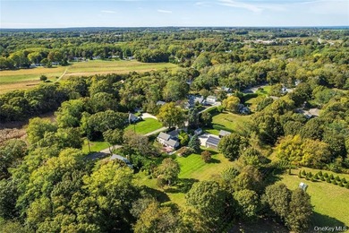 Set on 1.16 acres of beautifully landscaped and private grounds - photo 3