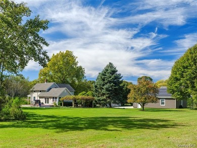 Set on 1.16 acres of beautifully landscaped and private grounds - photo 8