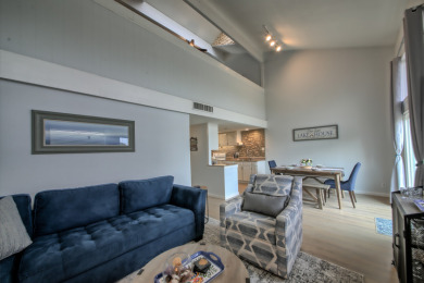 Fully updated systems, game room and golf cart storage - photo 6
