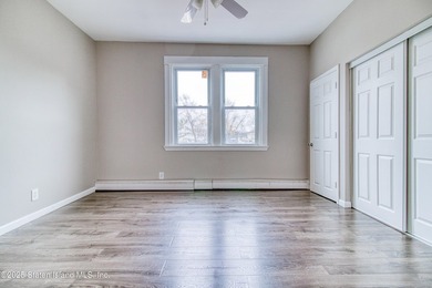 Rare find! This legal three-family home offers exceptional - photo 11