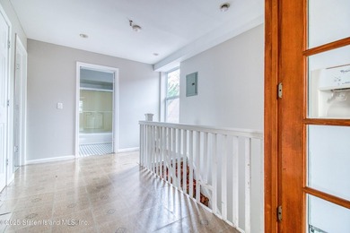 Rare find! This legal three-family home offers exceptional - photo 18