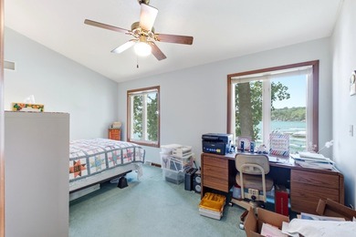 This charming two-story home sits right on the water's edge of - photo 21