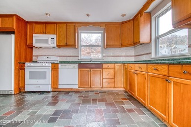 Rare find! This legal three-family home offers exceptional - photo 21