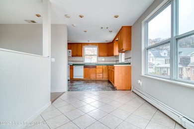 Rare find! This legal three-family home offers exceptional - photo 23