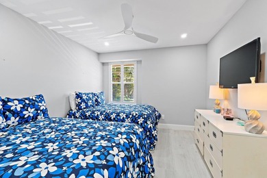 Welcome to this charming 2-bedroom, 2.5-bath condominium in the - photo 24