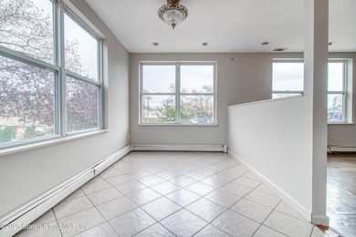 Rare find! This legal three-family home offers exceptional - photo 25