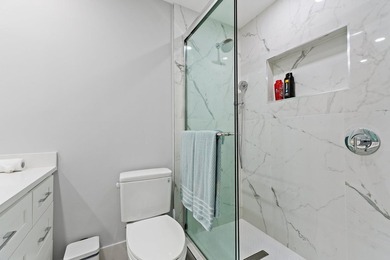 Welcome to this charming 2-bedroom, 2.5-bath condominium in the - photo 27