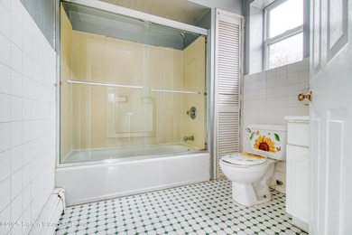 Rare find! This legal three-family home offers exceptional - photo 28
