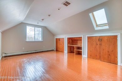 Rare find! This legal three-family home offers exceptional - photo 29