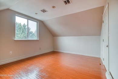 Rare find! This legal three-family home offers exceptional - photo 31