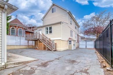 Rare find! This legal three-family home offers exceptional - photo 34