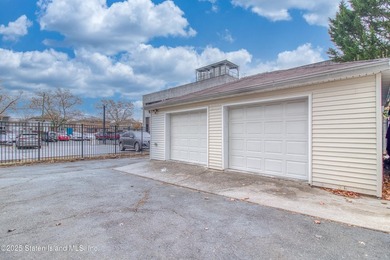 Rare find! This legal three-family home offers exceptional - photo 36