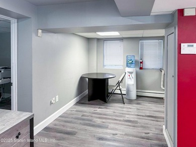 Rare find! This legal three-family home offers exceptional - photo 37