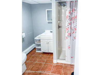 Rare find! This legal three-family home offers exceptional - photo 40