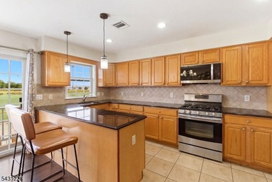 Thoughtfully updated, this spacious multi-level townhouse at - photo 13