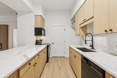 Elevated urban living awaits in this fully remodeled, impeccably