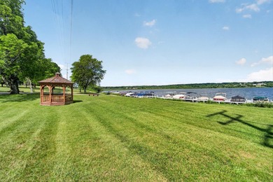 Enjoy Lake Como views from this updated 2nd-floor condo in the - photo 2