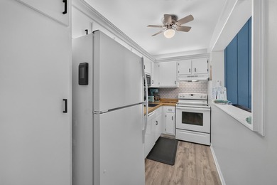 Enjoy Lake Como views from this updated 2nd-floor condo in the - photo 8