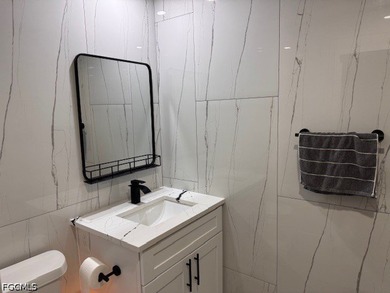 RENOVATED! CORNER UNIT! NEW ROOF! This beautifully renovated - photo 12