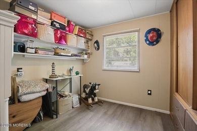 Welcome home! This stylish mobile home offers two bedrooms, a - photo 14