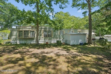 Welcome home! This stylish mobile home offers two bedrooms, a - photo 16