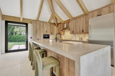 Welcome to an extraordinary residence that seamlessly blends - photo 6