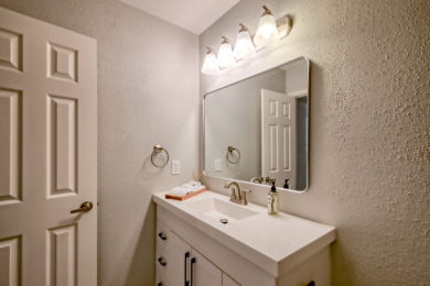 Fully updated systems, game room and golf cart storage - photo 9