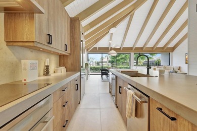 Welcome to an extraordinary residence that seamlessly blends - photo 9