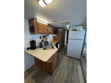 Cleared lot with camper with addition. Lot is fully stoned...NO - photo 4