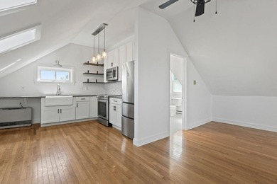 Perched above-it-all in Bayside, this freshly painted penthouse - photo 6