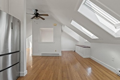 Perched above-it-all in Bayside, this freshly painted penthouse - photo 7