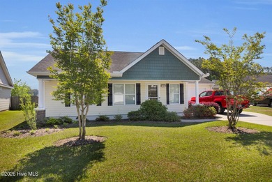 Welcome to this charming three-bedroom, two-bathroom home in - photo 8