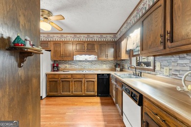 Well-kept and ready to go, this solid brick home offers comfort - photo 17