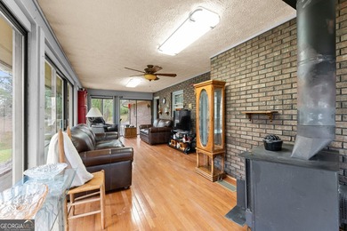Well-kept and ready to go, this solid brick home offers comfort - photo 23