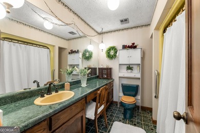 Well-kept and ready to go, this solid brick home offers comfort - photo 26