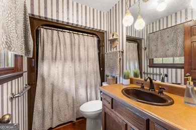 Well-kept and ready to go, this solid brick home offers comfort - photo 30