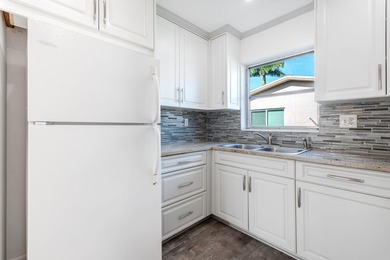 1 bedroom 1.5 baths. Fully remodeled. Enjoy vibrant living in - photo 3