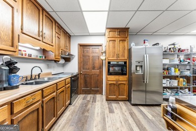 Well-kept and ready to go, this solid brick home offers comfort - photo 43