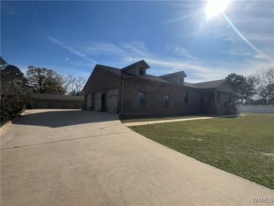 Charming 3 bedroom, 2 bath brick home offering comfort and