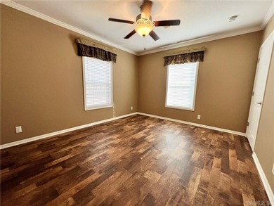 Well-maintained home on approximately 6 acres with a stocked