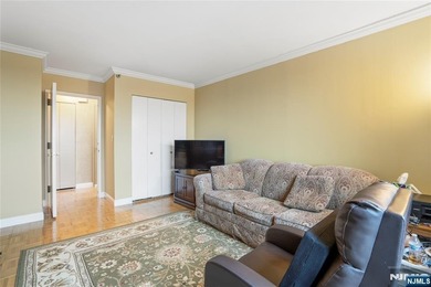 Welcome to Residence 14R at the Atrium, a beautifully maintained