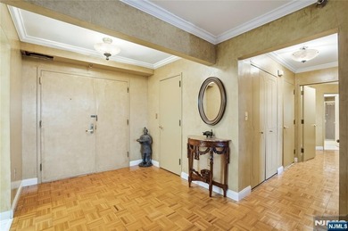 Welcome to Residence 14R at the Atrium, a beautifully maintained