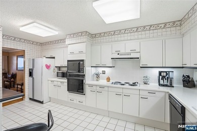 Welcome to Residence 14R at the Atrium, a beautifully maintained